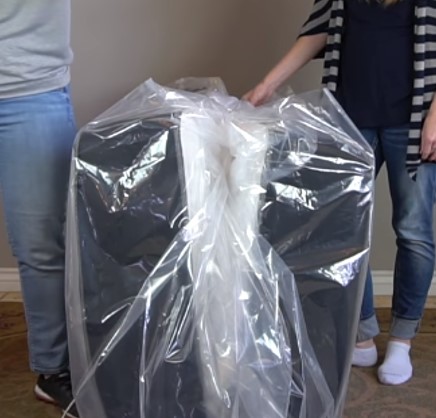 Moving a queen-size mattress using a folded method